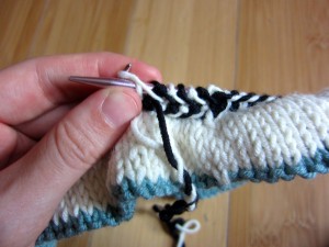 Continue bringing the working yarn over the other(s). The twists in the yarn created in Round 1 will untwist as you work.