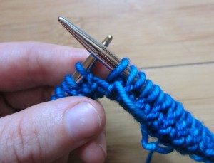 Step 4: Transfer stitch from L needle to R needle. Notice that this does not twist the st.