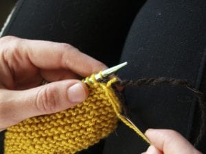 Step 4: Drop the first stitch from the needle.