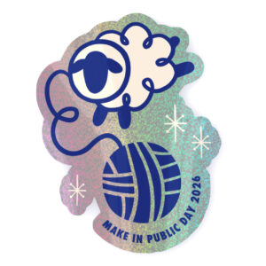 A colorful sticker featuring a cartoon sheep with one eye, playing with a ball of yarn, and text reading 'MAKE IN PUBLIC DAY 2026.'