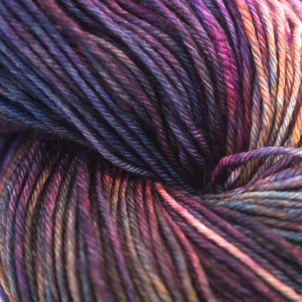 Closeup of a skein of Malabrigo Arroyo yarn.