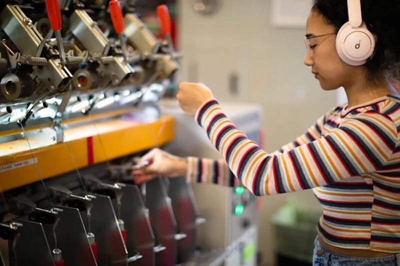 Jasmine of Spincycle Yarns in the mill.