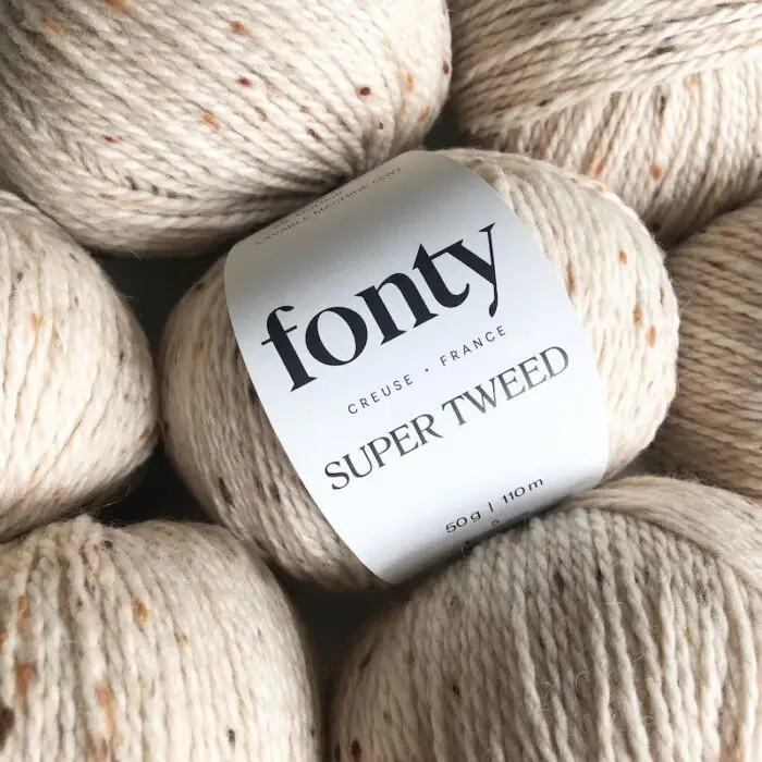 Balls of Fonty Super Tweed yarn.