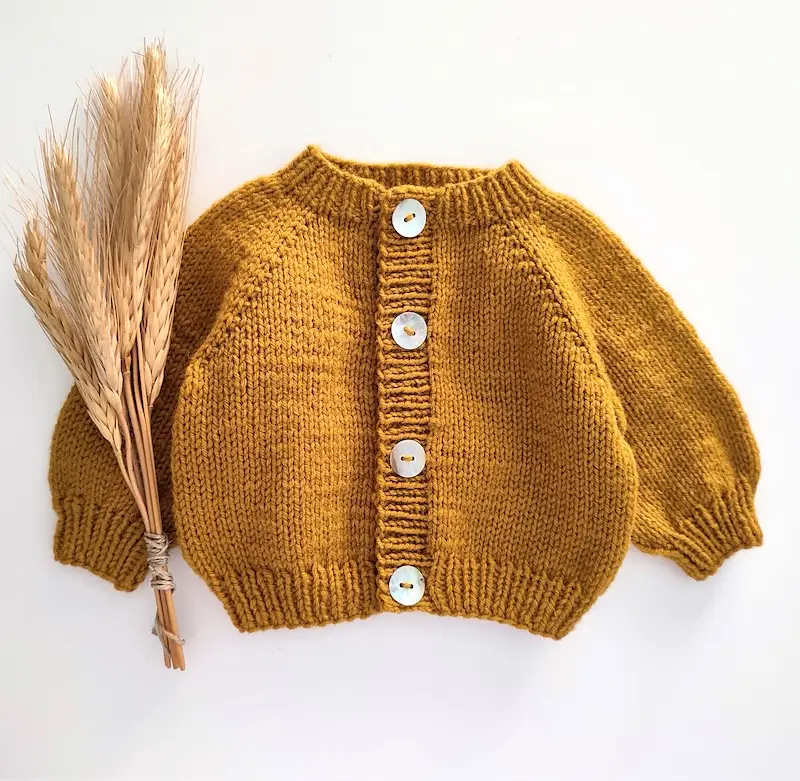Calendula Baby Cardigan pattern by Sandra Magalhães