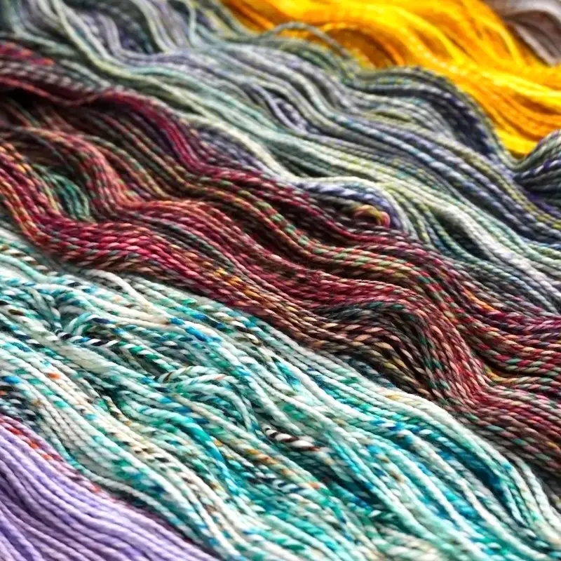 Loose skeins of Malabrigo Torzal yarn.